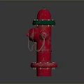 Building Exterior Red Fire Hydrant With Green Top And Metal Chains