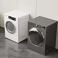 Modern White And Gray Front Load Washing Machines In Laundry Space