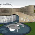 Vibrant Children's Play Area With Circular Climbing Structures Slides Umbrellas On Green Turf