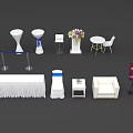 White Table and Chair Set with Sofa Flower Arrangement Signage and Stanchions for Event Setup