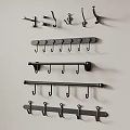Different Styles Of Wall Hooks With Multiple Hooks Installed On Light Wall