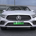 White Mercedes-Benz Electric Sedan With Modern Sleek Body LED Headlights And Front Logo