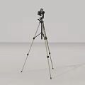 Sturdy Professional Tripod Stand With Digital Camera Mounted For Photography And Video Recording