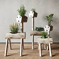 Decorative Wooden Garden Planters Featuring Animal Face Design Various Plants And Different Heights