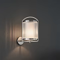 Modern Wall Light with Metal Frame and Ribbed Glass Shade Mounted on Dark Wall