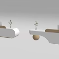 Modern White Store Front Desk With Curved Design And Decorative Plant