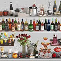Assorted Wine Bottles and Cocktail Glasses Display with Floral Arrangements and Fresh Fruits