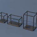 Three Dark Metal Frame Cubic Storage Racks For Home Organizing And
