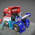 Electric Toy Race Truck With Racing Driver Figure And Multiple Sponsor Logos