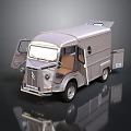 Vintage Silver Truck Model With Open Doors And Brown Interior Seats