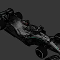 Silver And Green Formula 1 Racing Car With PETRONAS Logo And Streamlined Body Design