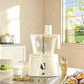 Bright Modern Kitchen Countertop With White Food Processor Toaster Fresh Limes And Glassware