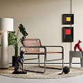 Stylish Leather Leisure Chair With Metal Frame Green Plant Floor Lamp And Wall Art On Rug