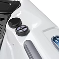 Modern White Square Whirlpool Bathtub With Bubbling Water Jets Control Panel And Blue Accents