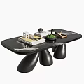Modern Unique Design Coffee Table Featuring Black Curved Legs Marble Top and Decorative Books Plants