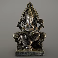Intricate Ganesha Metal Sculpture With Decorative Carvings Holding Book And Ornate Base