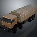 Brown Military Cargo Truck With Camouflage Tarp Covered Bed And Multiple Wheels