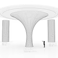 Three Unique Interior Columns With Circuit Like Patterns And Circular Illuminated Top