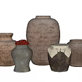 Handcrafted Ceramic Vessels With Rustic Textures And Decorative Accents On