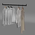 Light Colored Clothes Hanging On Black Rod With Various Styles