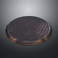 Round Metal Manhole Cover With Grid Pattern And Rustic Surface Design