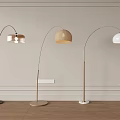 Sleek Arched Floor Lamps With Golden Beige White Shades And Black Gold White Bases