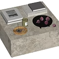 Modern Coffee Table with Stacked Books Magazine Green Candle Black Tray and Purple Decorative Balls