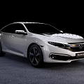 White Modern Sedan Car With Sleek Exterior Design And Black Alloy Wheels