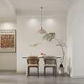 Modern Living Dining Area With Beige Sofa Round Coffee Table And Chic Decor
