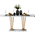 Elegant Marble Top Dining Table With Gold Metal Legs Greenery Wine Glasses And Plated Food