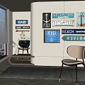 Modern Interior Accent Chair With Beach Themed Wall Decor Signs And Natural Light