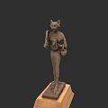 Ancient Egyptian Cat Goddess Sculpture with Ceremonial Objects on Wooden Base