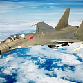 Military Fighter Jet Flying High Above Cloudy Blue Sky With Weapons