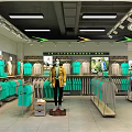 Modern Bright Clothing Store Interior With Spacious Layout And Neat Apparel Footwear Display Racks