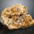 Mineral Crystal Specimen With Pale Yellow And White Crystalline Formations On Gray Matrix