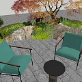 Tranquil Garden Landscape With Green Chairs Black Round Table Stone Paved Ground And Colorful Trees