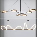 Modern Contemporary Chandelier With Circular Rings And Curved Illuminated Metal Lines