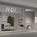 HOI Clothing Store Interior With Transparent Glass Facade Hanging Clothes And Mannequins