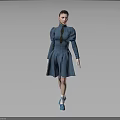 Woman Wearing Blue Dress with Braid and Blue Shoes Standing Against Gray Background