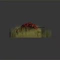 Red Flower Shaped Object With Wings Placed On Green Grass Area