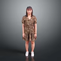 Woman in Gold Sequin Dress Standing Against Gray Background with White Sneakers