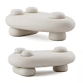 White Modern Coffee Table With Rounded Shapes And Unique Base Design