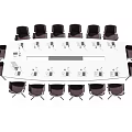 Modern Conference Table With Black Chairs And White Surface In Meeting Room Setup