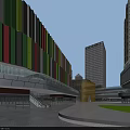 Modern Commercial Street Featuring Colorful Striped Facades High Rise Buildings And Open Plaza