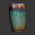 Colorful Ceramic Vase With Blue Green Red Orange Gradient And Glossy Finish On Dark Background