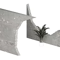Concrete Wall With Irregular Edges Featuring Green Palm Plant In White Planter