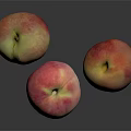 Three Fresh Pink and Yellow Peaches on Dark Background with Reflections