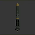 Green Military Guided Missile With Golden Tip And Cylindrical Body On Gray Display Background