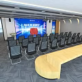 Modern Conference Room Interior Design With Large Screen Chairs And Wooden Long Table