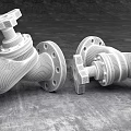 Industrial Blue Valves With Red Handles And Flanged Design On Concrete Surface